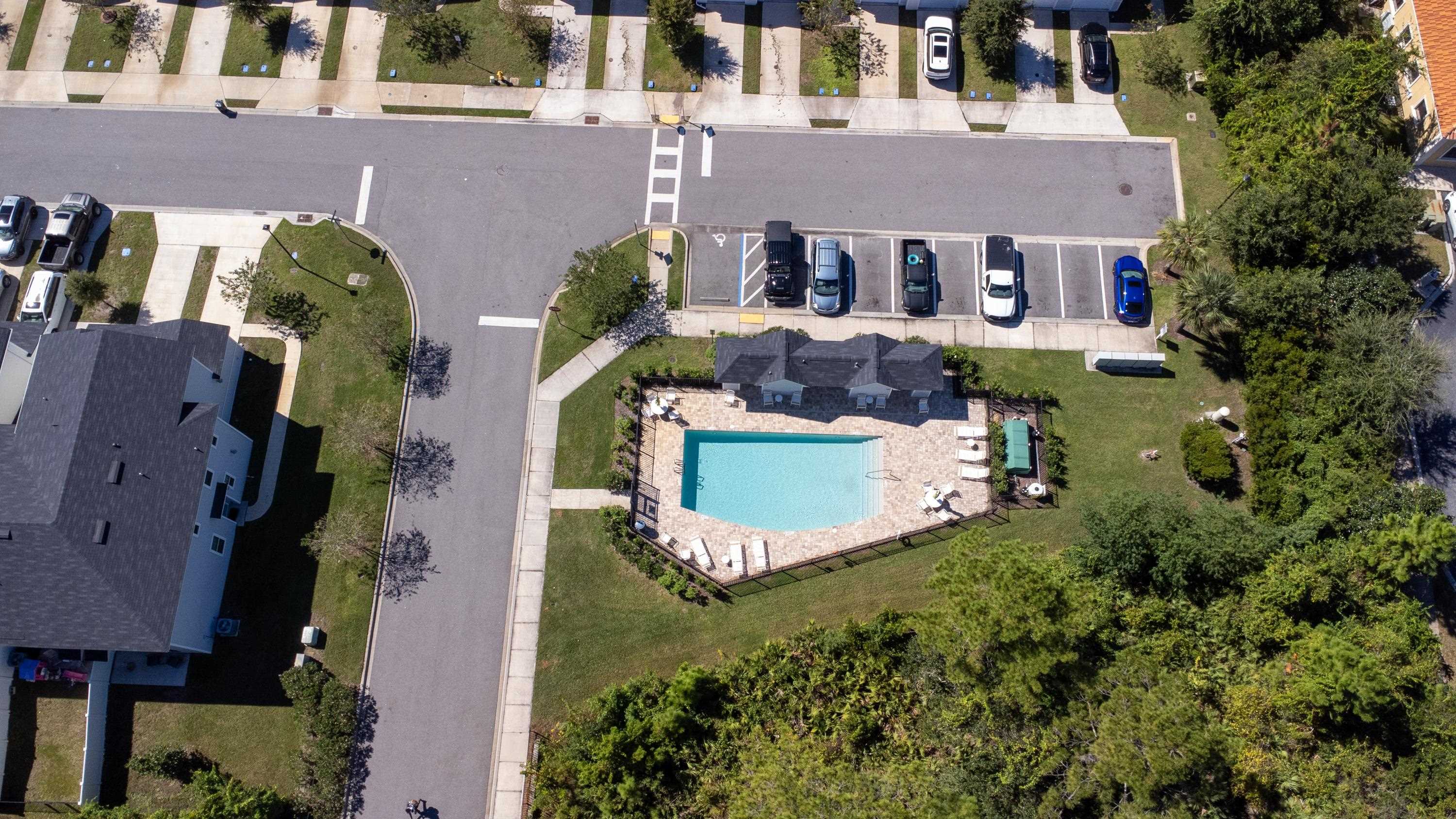81 Ridge Lake Rd Street St. Augustine, FL 32086 - Photo 37 of 41 an aerial view of multiple houses with yard