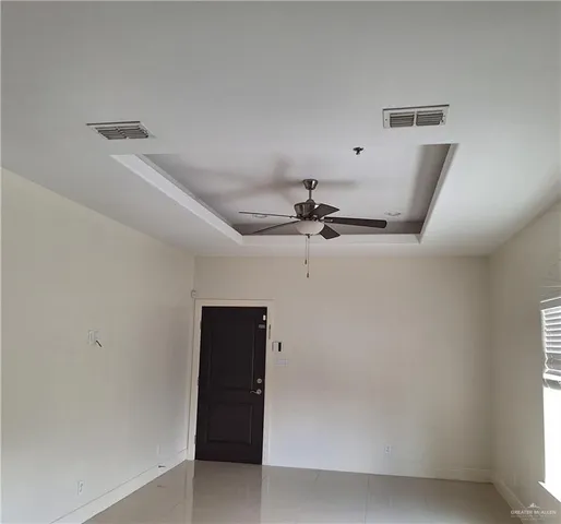 a view of room with a flat screen tv