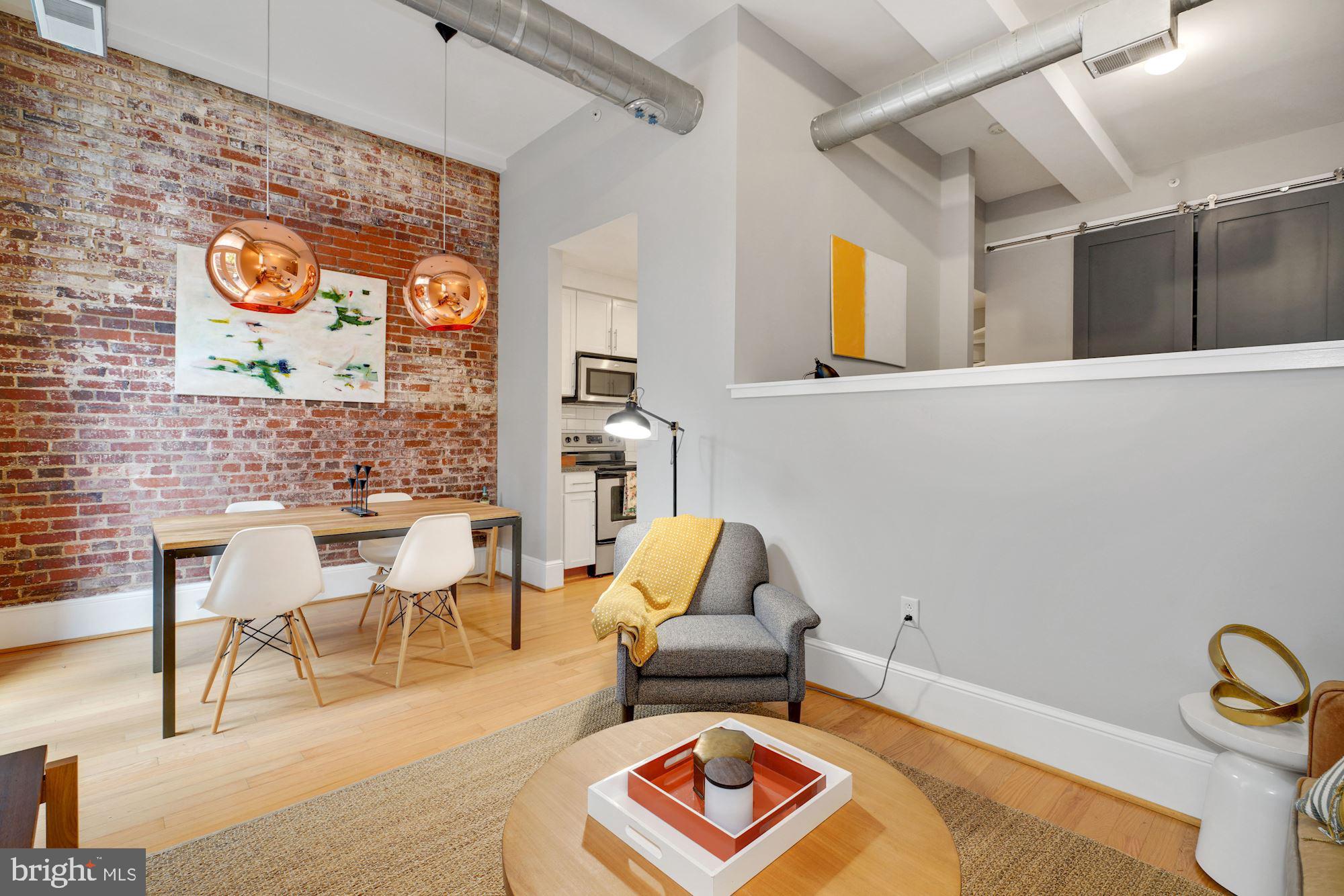 2035 2nd Street Northwest, Unit GL05 Washington, DC 20001 - Photo 13 of 30 Exposed brick wall/hardwood floors
