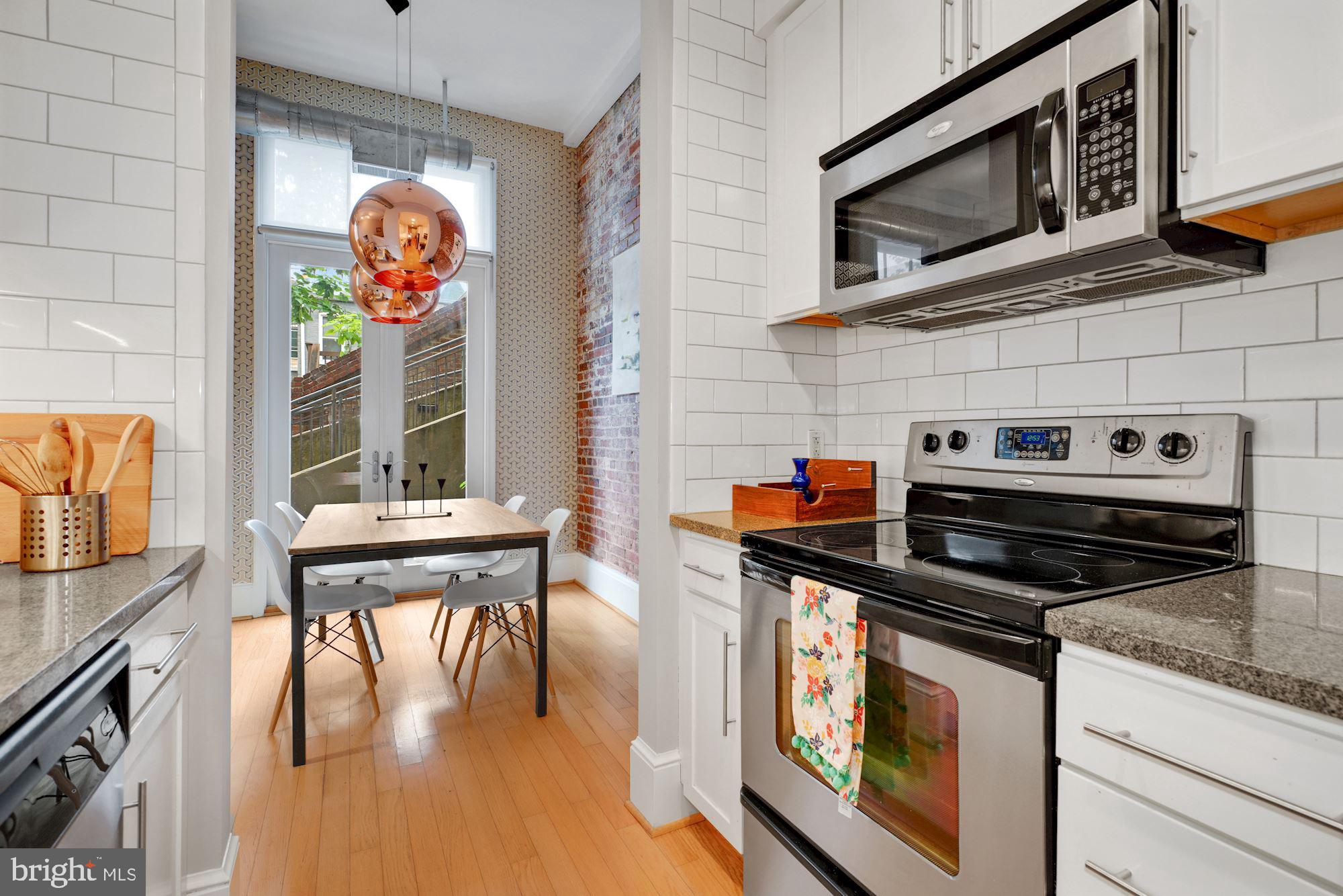 2035 2nd Street Northwest, Unit GL05 Washington, DC 20001 - Photo 7 of 30 Ktichen with hardwood floors