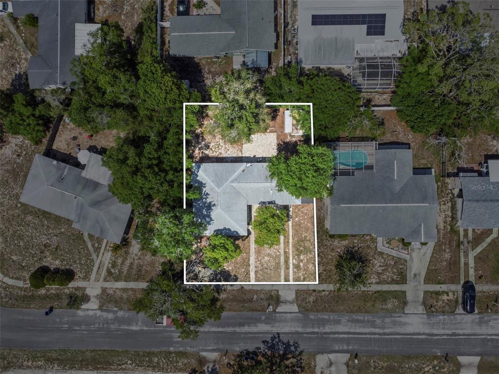 6221 Dalton Street Spring Hill, FL 34606 - Photo 3 of 40 an aerial view of a house with street