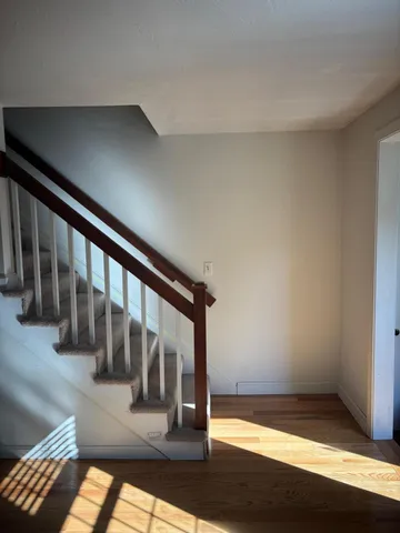 a view of staircase with large window