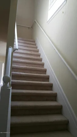 a view of a kitchen with a sink