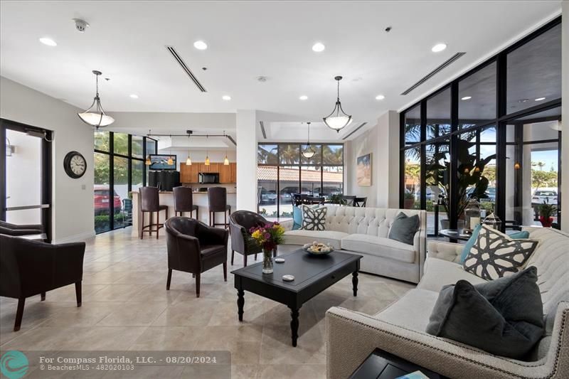 600 Ocean Drive, Unit 8D Juno Beach, FL 33408 - Photo 27 of 37 a living room with furniture and a large window