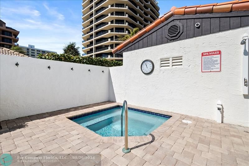 600 Ocean Drive, Unit 8D Juno Beach, FL 33408 - Photo 31 of 37 a view of a back yard of the house