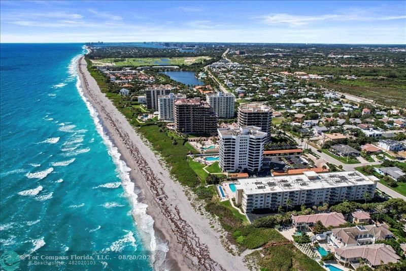 600 Ocean Drive, Unit 8D Juno Beach, FL 33408 - Photo 33 of 37 a view of a city with tall buildings