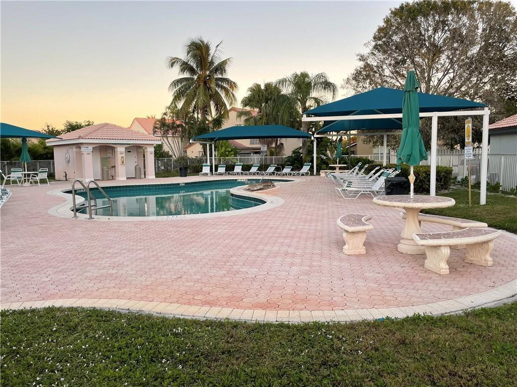 Undisclosed Address Miramar, FL 33029 - Photo 15 of 23 a view of a house with backyard and sitting area