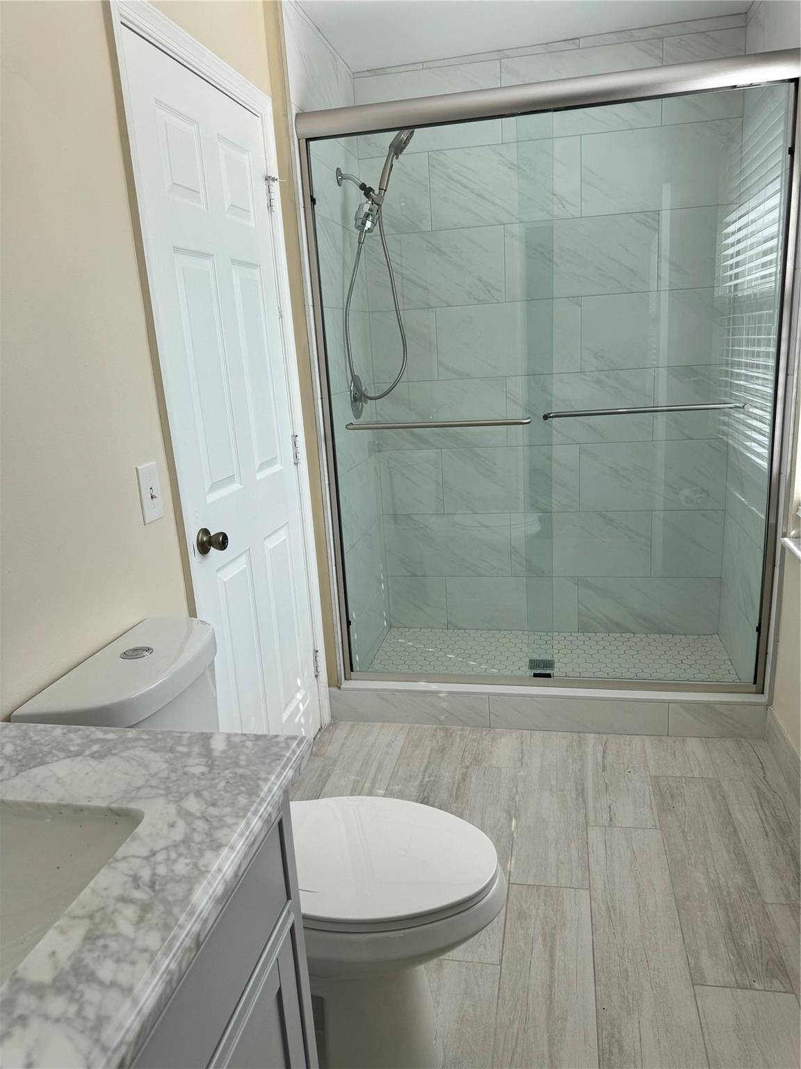 Undisclosed Address Miramar, FL 33029 - Photo 19 of 23 a bathroom with a granite countertop shower and a sink