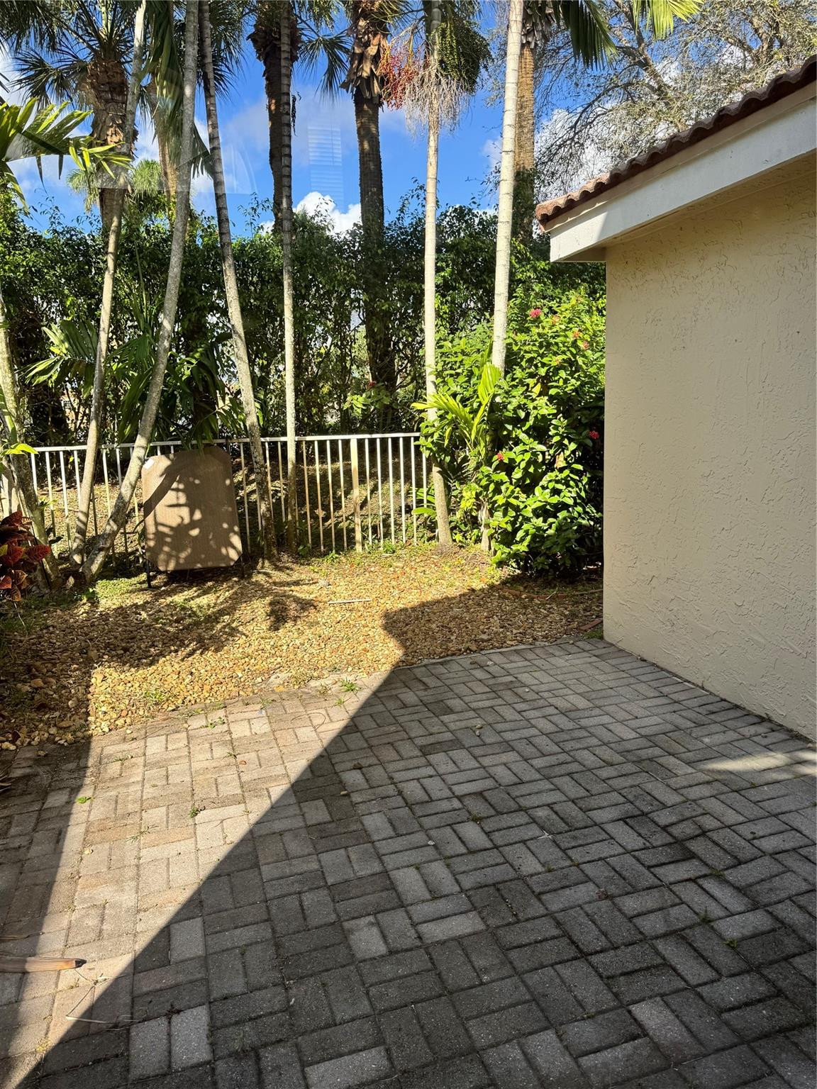 Undisclosed Address Miramar, FL 33029 - Photo 23 of 23 a view of a backyard of the house