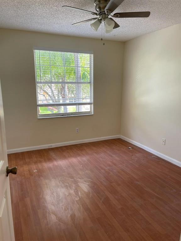Undisclosed Address Miramar, FL 33029 - Photo 5 of 23 an empty room with a window