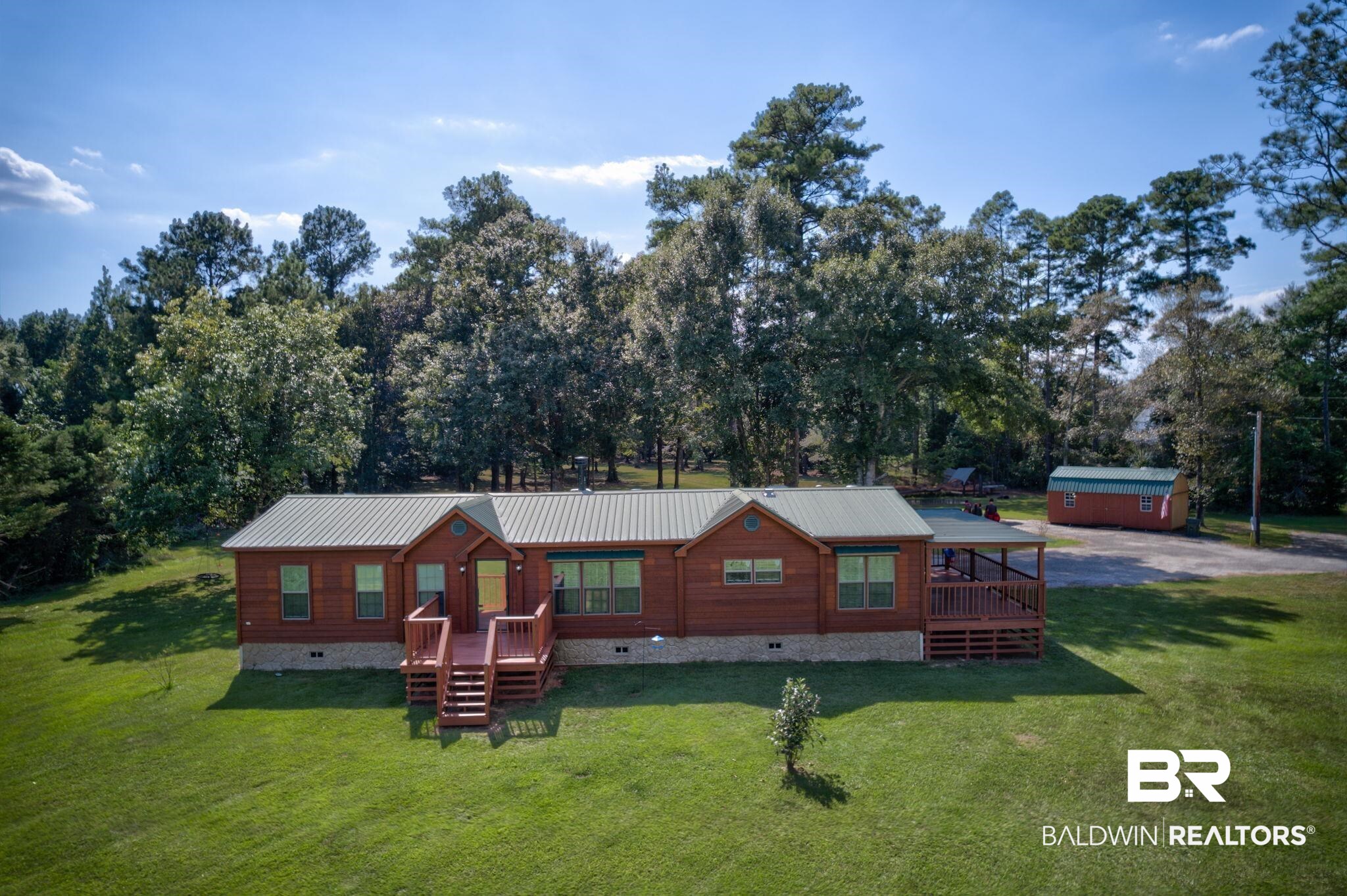 35641 County Road 39 Stapleton, AL 36578 - Photo 39 of 46 View of front facade with a front lawn and a garage