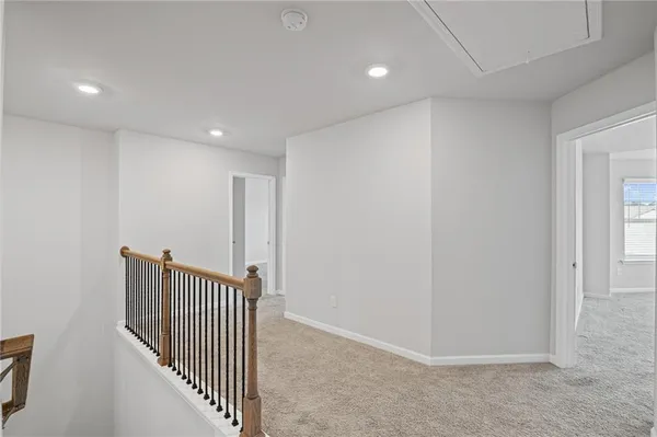 a view of a hallway with entryway