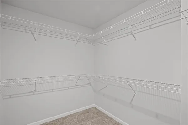 a view of a room with racks on the wall