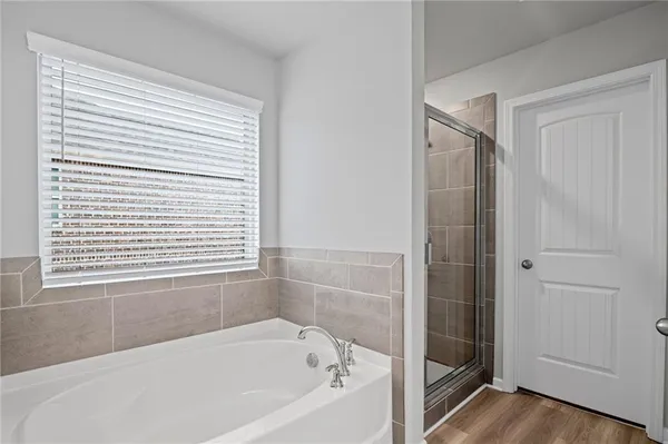 a view of a house with backyard of the house