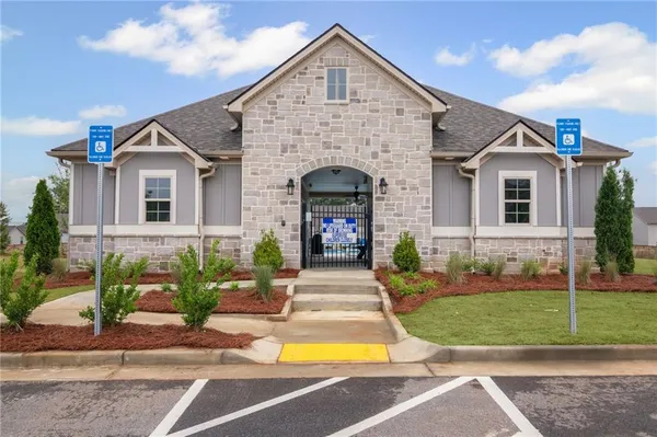 a view of a swimming pool with outdoor seating space