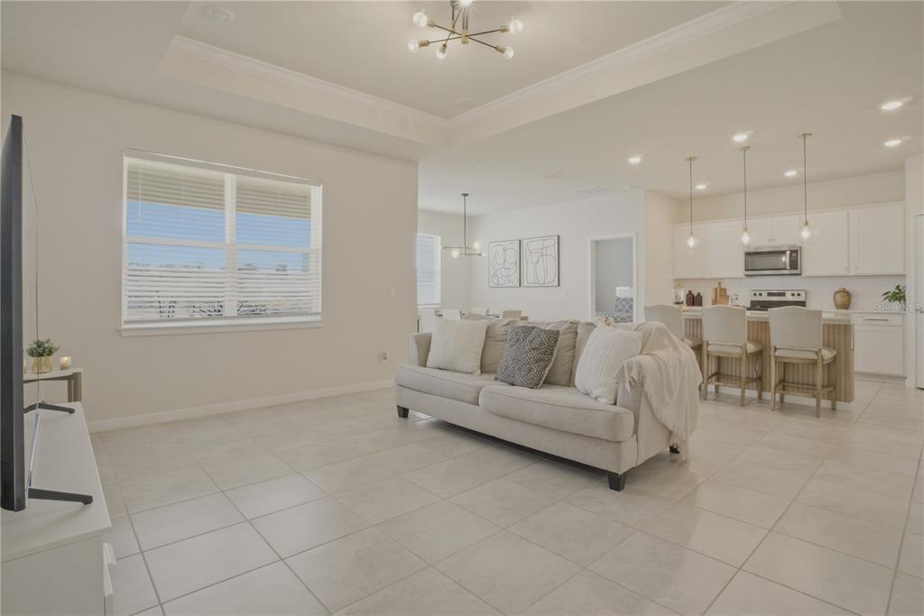 1821 Groveline Road St. Cloud, FL 34771 - Photo 15 of 36 a living room with furniture and a large window