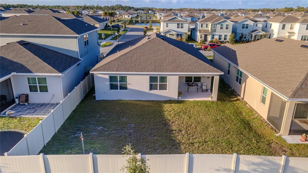 1821 Groveline Road St. Cloud, FL 34771 - Photo 31 of 36 a aerial view of a house with swimming pool
