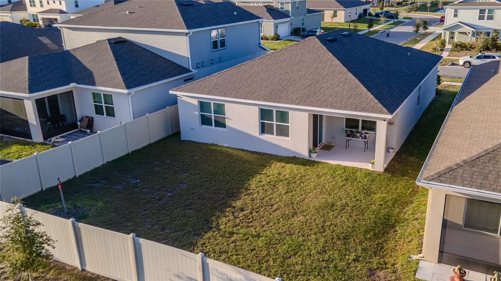 1821 Groveline Road St. Cloud, FL 34771 - Photo 32 of 36 a aerial view of a house with a yard