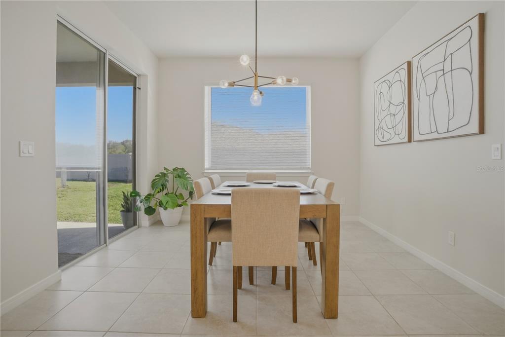 1821 Groveline Road St. Cloud, FL 34771 - Photo 5 of 36 a view of a dining room with furniture window and outside view