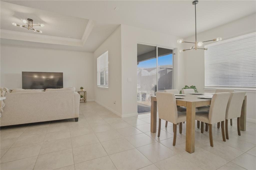 1821 Groveline Road St. Cloud, FL 34771 - Photo 6 of 36 a dining room with furniture and window