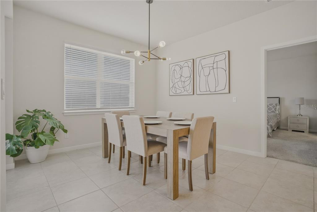 1821 Groveline Road St. Cloud, FL 34771 - Photo 7 of 36 a view of a dining room with furniture