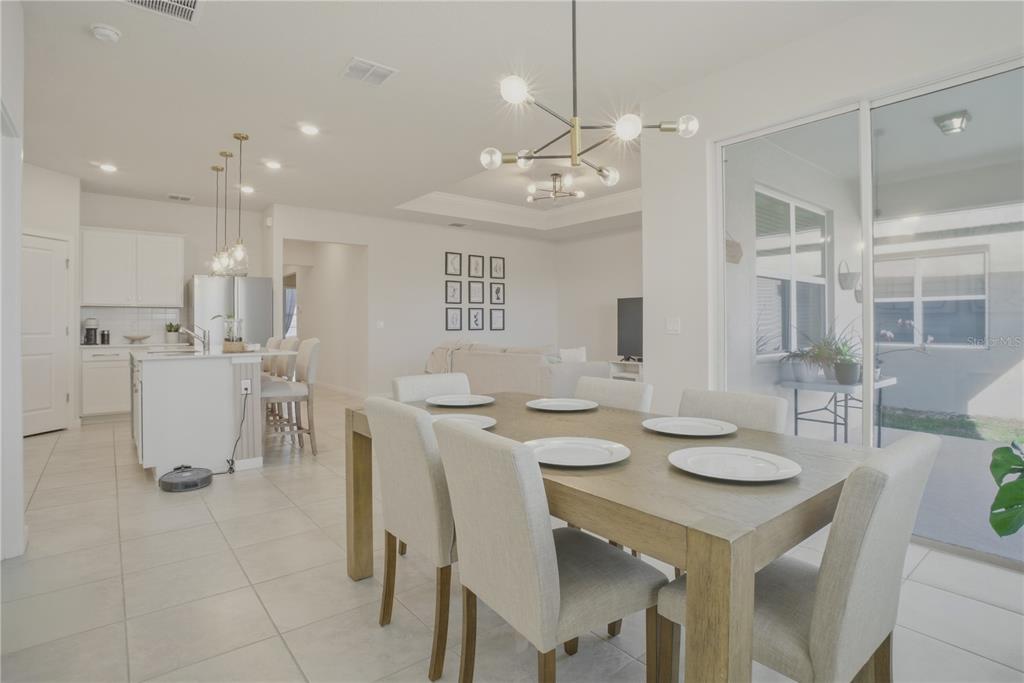 1821 Groveline Road St. Cloud, FL 34771 - Photo 9 of 36 a view of a dining room and livingroom