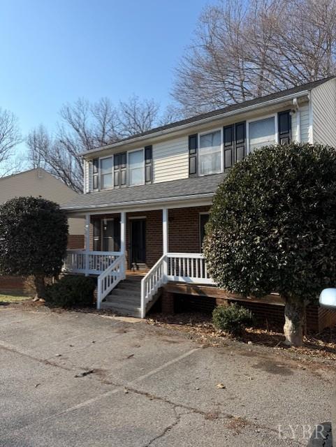 1822 Wards Ferry Road, Unit A&B Lynchburg, VA 24502 - Photo 7 of 31 a front view of a house with a yard
