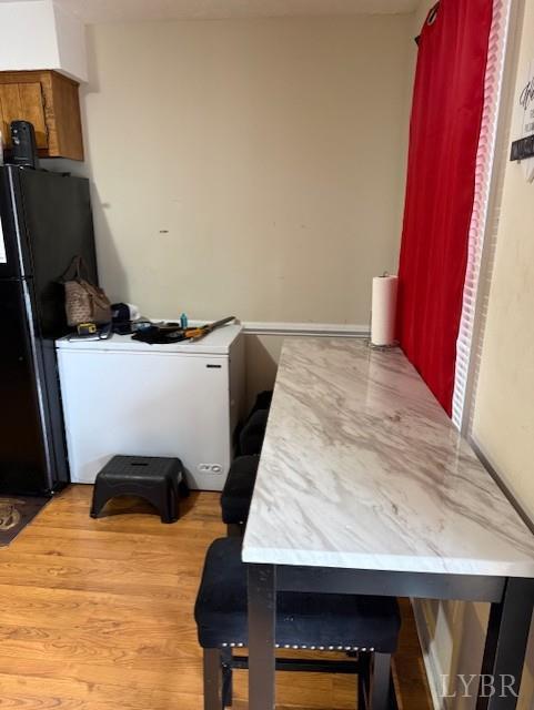 1822 Wards Ferry Road, Unit A&B Lynchburg, VA 24502 - Photo 9 of 31 a room with a bed and wooden floor