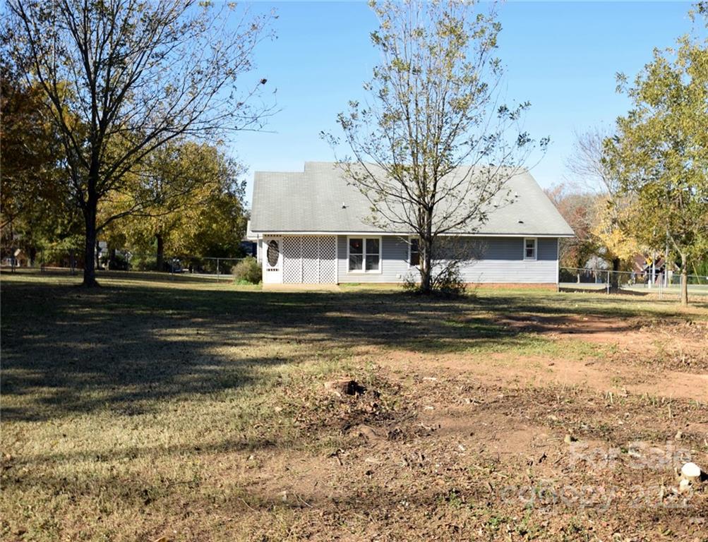 1909 Fletcher Broome Road, Unit 7 Monroe, NC 28112 - Photo 25 of 25 a view of back yard of the house