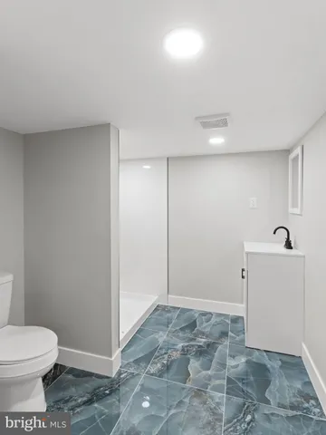 a bathroom with a toilet