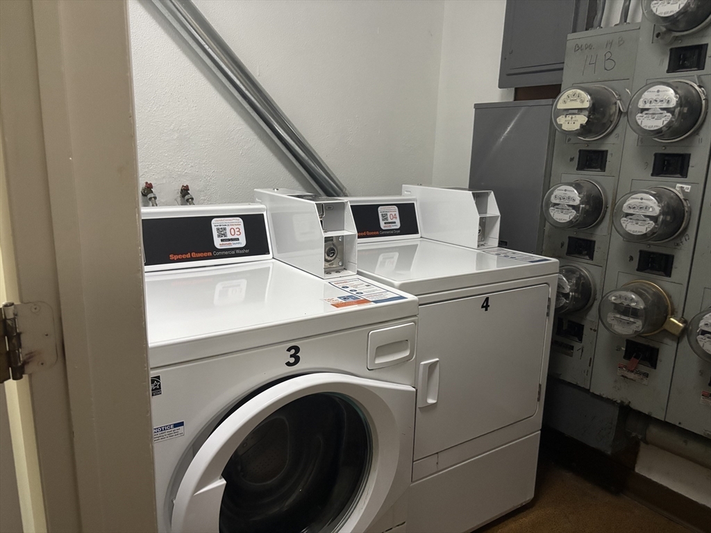 14 B Mayberry Drive, Unit 6 Westborough, MA 01581 - Photo 11 of 12 a utility room with dryer and washer