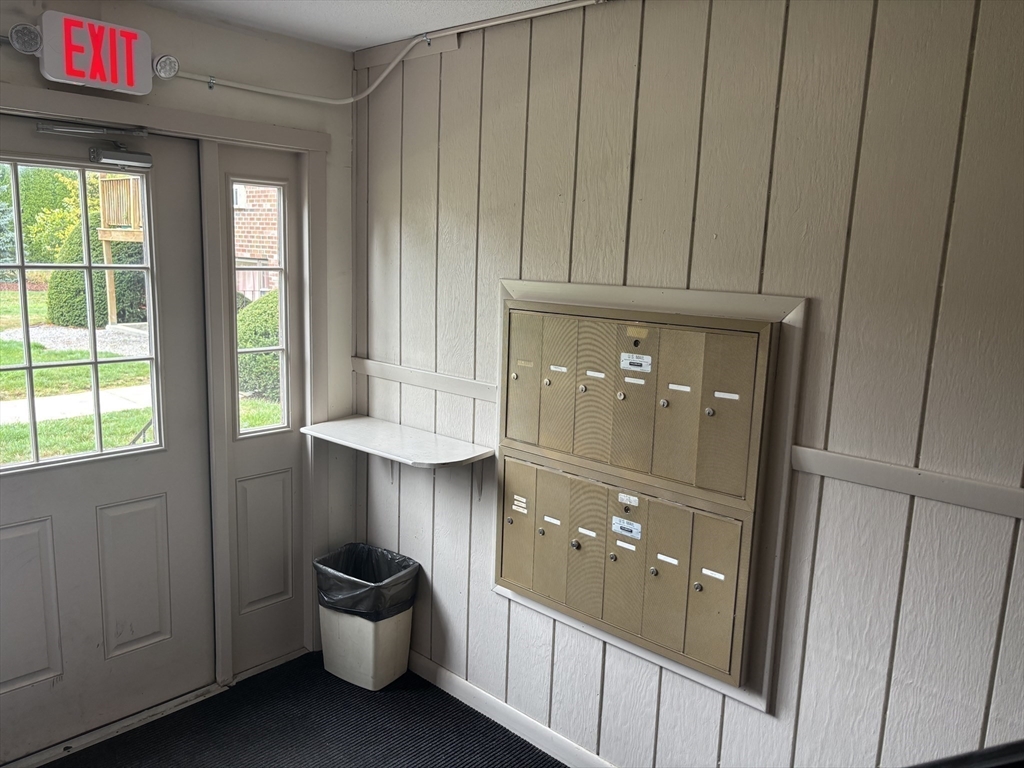 14 B Mayberry Drive, Unit 6 Westborough, MA 01581 - Photo 12 of 12 a bathroom with a sink and a mirror