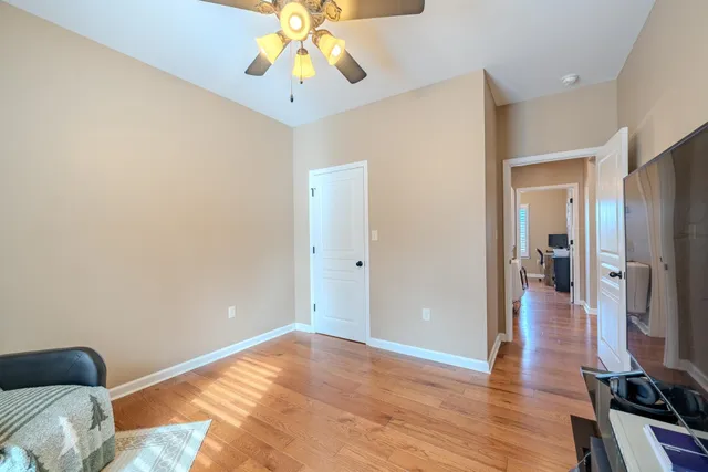 a view of a livingroom with wooden floor