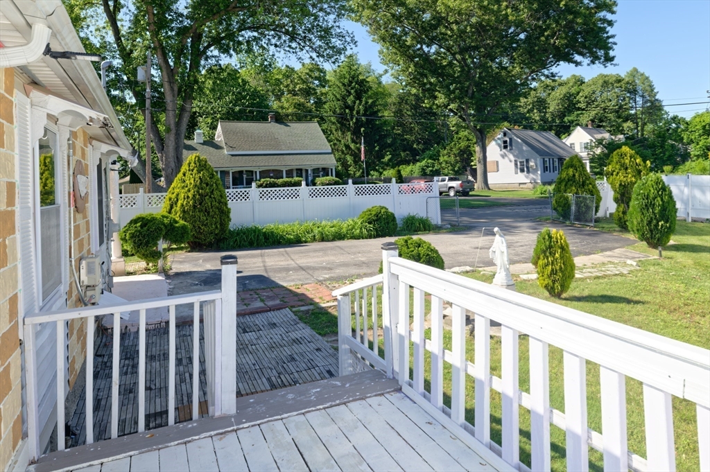 1 Rockland Rd Court Auburn, MA 01501 - Photo 7 of 38 a view of house with a yard and furniture