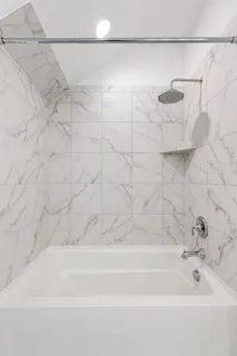 a bathroom with a bathtub