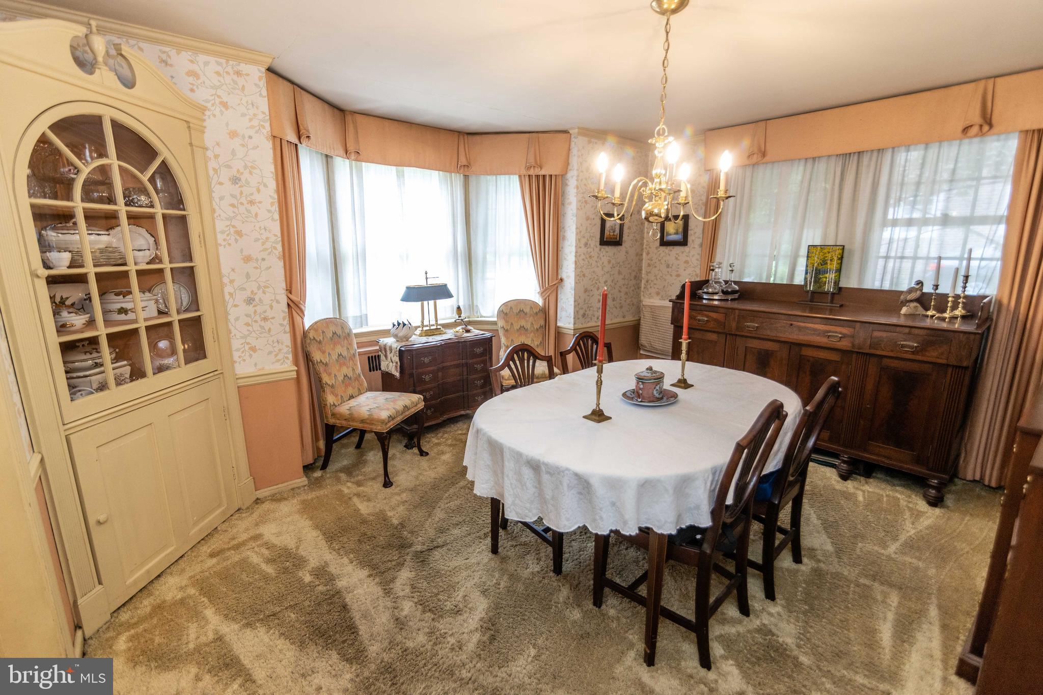 2 Green Valley Road Wallingford, PA 19086 - Photo 11 of 35 a view of a dining room with furniture window and outside view