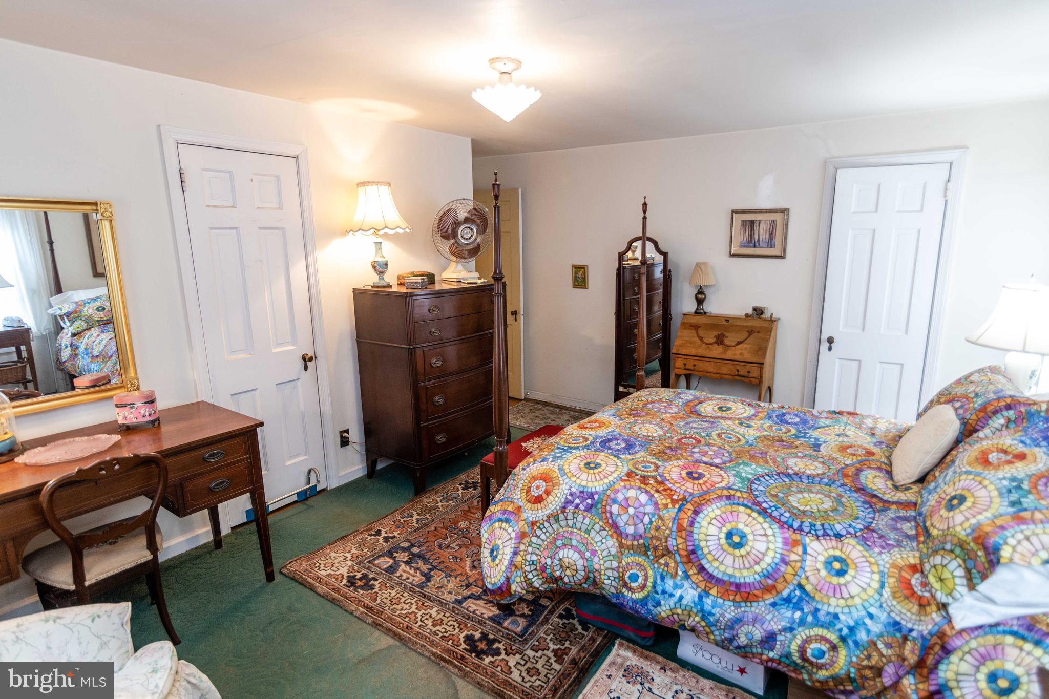 2 Green Valley Road Wallingford, PA 19086 - Photo 18 of 35 a bedroom with a bed and wooden floor