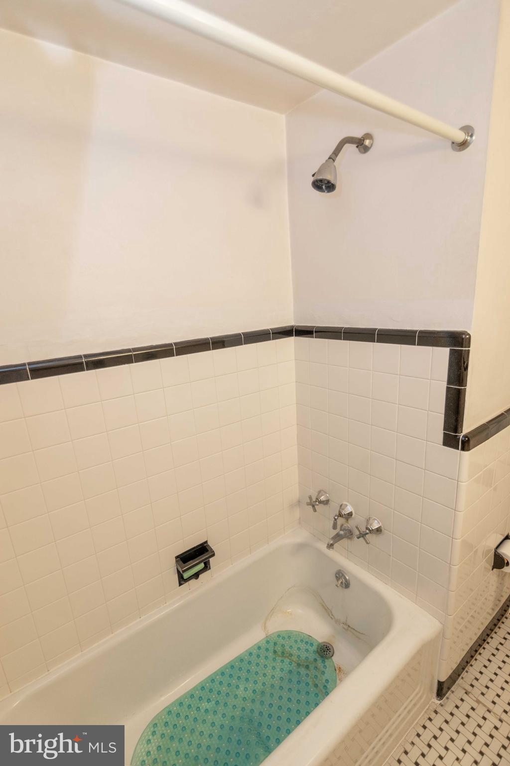2 Green Valley Road Wallingford, PA 19086 - Photo 27 of 35 a bathroom with a bath tub and a shower