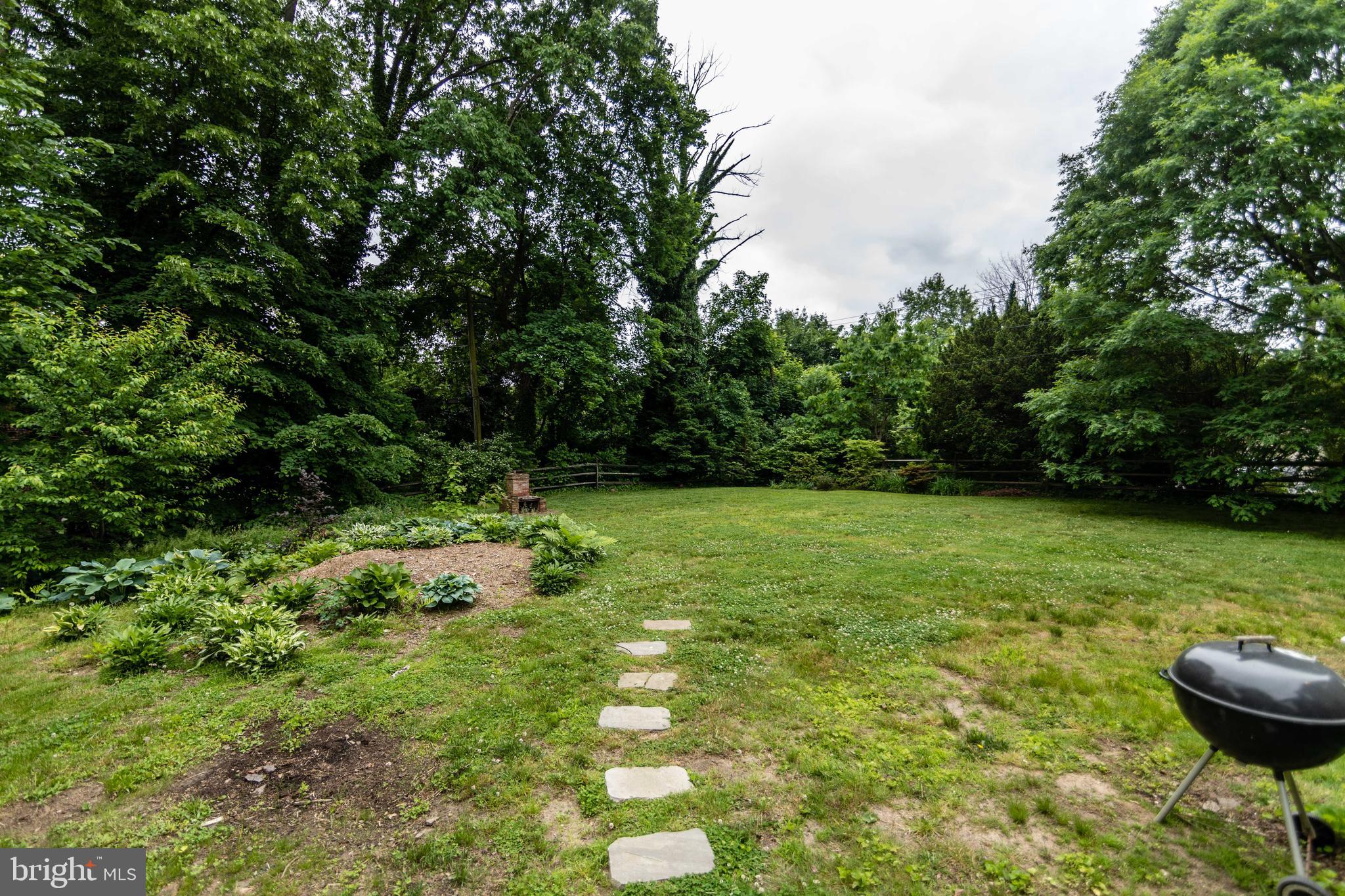 2 Green Valley Road Wallingford, PA 19086 - Photo 32 of 35 a backyard of a house with lots of green space