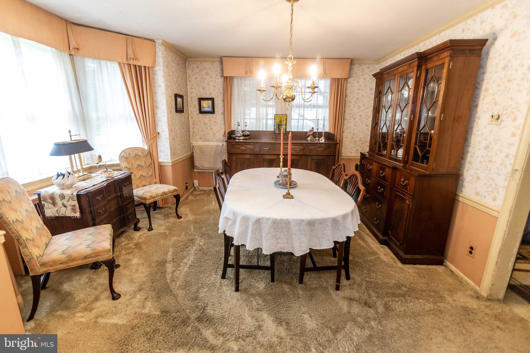 2 Green Valley Road Wallingford, PA 19086 - Photo 10 of 35 a view of a dining room with furniture window and outside view