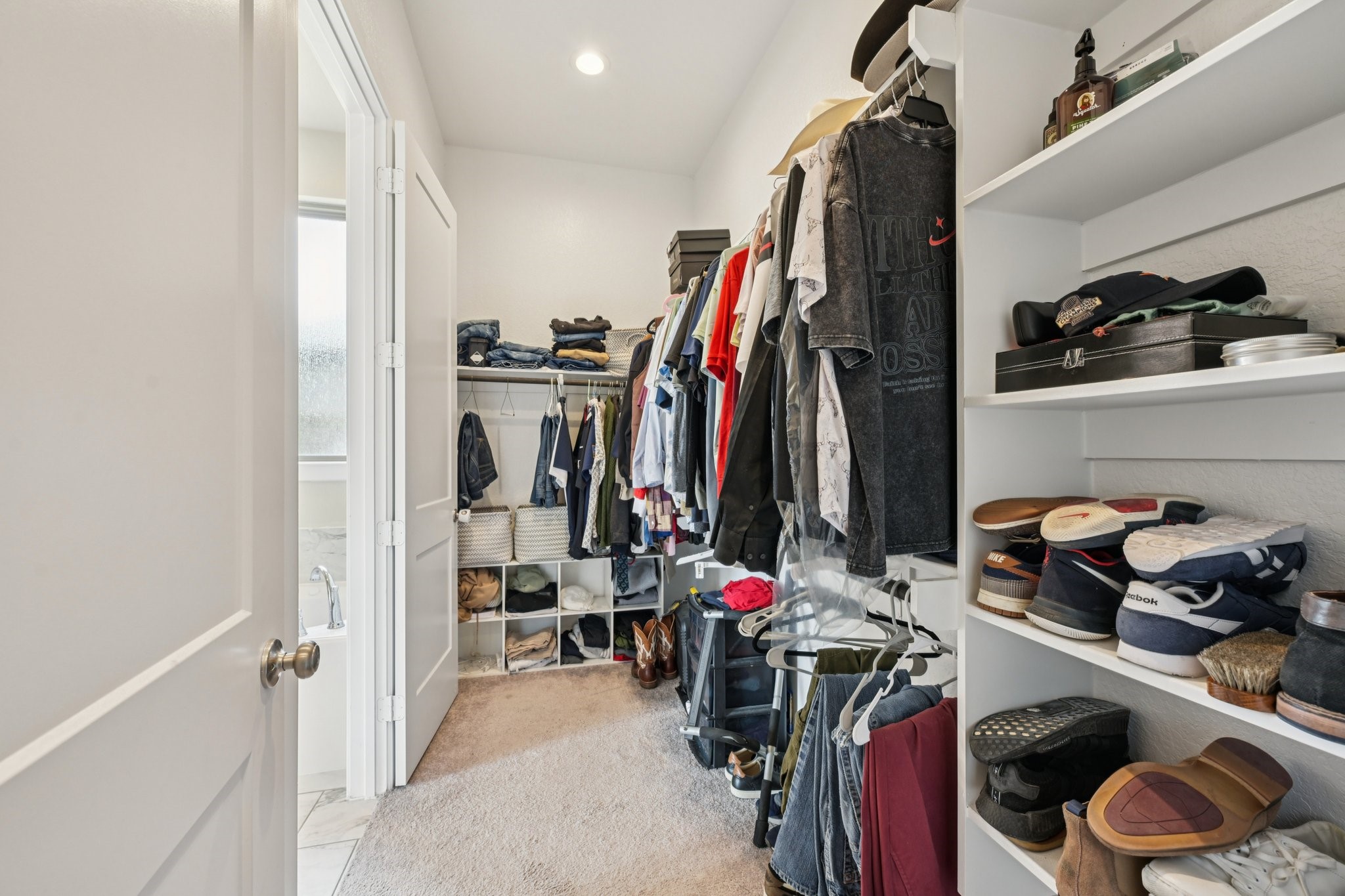 4734 Franklin Way Iowa Colony, TX 77583 - Photo 27 of 33 1st primary bedroom walk-in closet