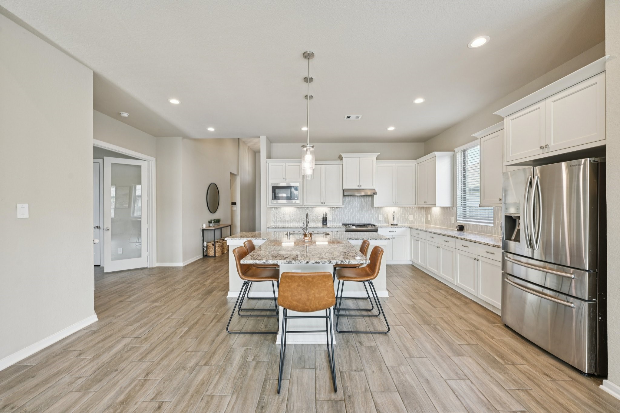 4734 Franklin Way Iowa Colony, TX 77583 - Photo 3 of 33 Kitchen with T-shaped island