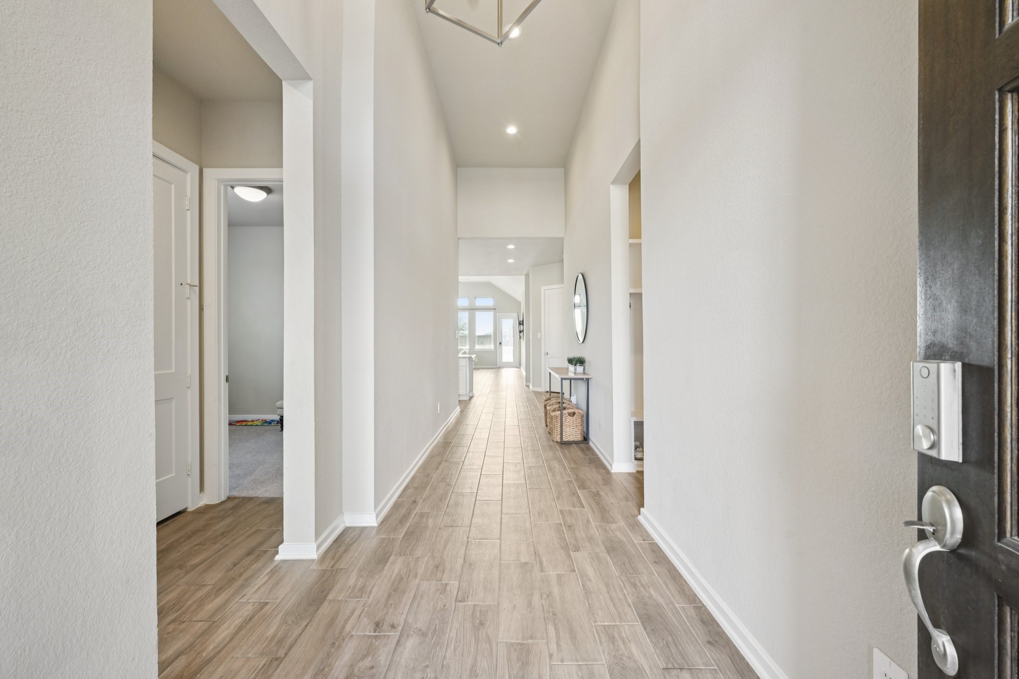 4734 Franklin Way Iowa Colony, TX 77583 - Photo 10 of 33 Entry way to the kitchen/living room. To the left you will find 2 bedrooms with a shared bathroom in the middle. To the right will be a bedroom with an en-suite bathroom