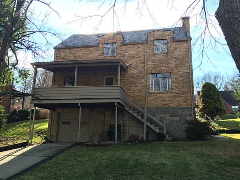 215 East Elmhurst Road Green Tree, PA 15220 - Photo 3 of 18 Exterior Back. Easy access to the garage with extra parking in the driveway.