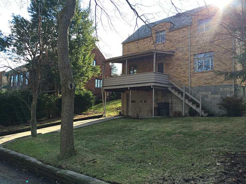 215 East Elmhurst Road Green Tree, PA 15220 - Photo 4 of 18 Exterior Back. Notice the yard and the covered back deck!