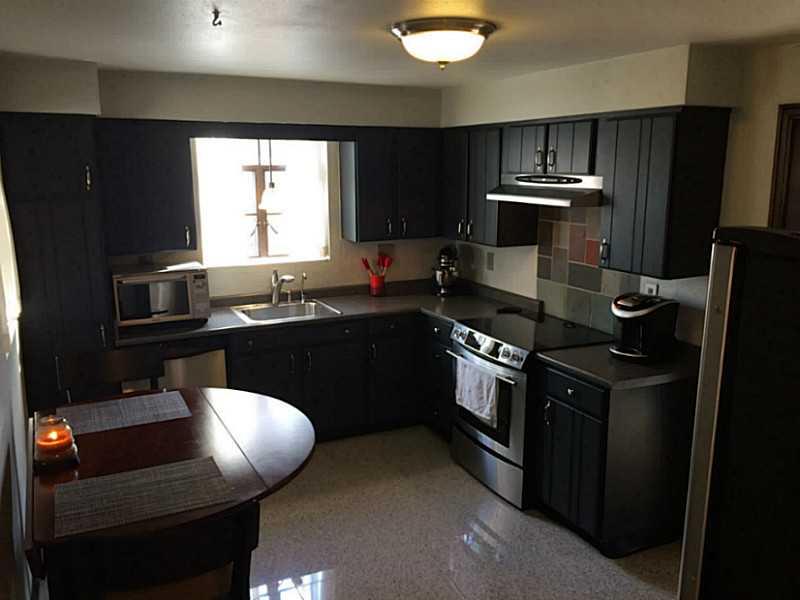 215 East Elmhurst Road Green Tree, PA 15220 - Photo 5 of 18 Kitchen. Updated kitchen with granite tile floors and stainless steel appliances!