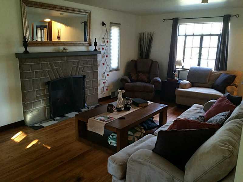 215 East Elmhurst Road Green Tree, PA 15220 - Photo 7 of 18 Living Room. Spacious living room with cozy electric fireplace!