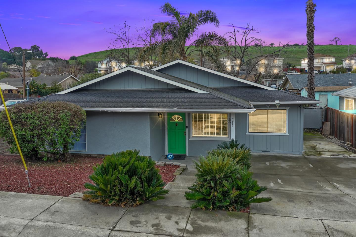 4298 Arthur Road Martinez, CA 94553 - Photo 3 of 32 a house with trees in the background