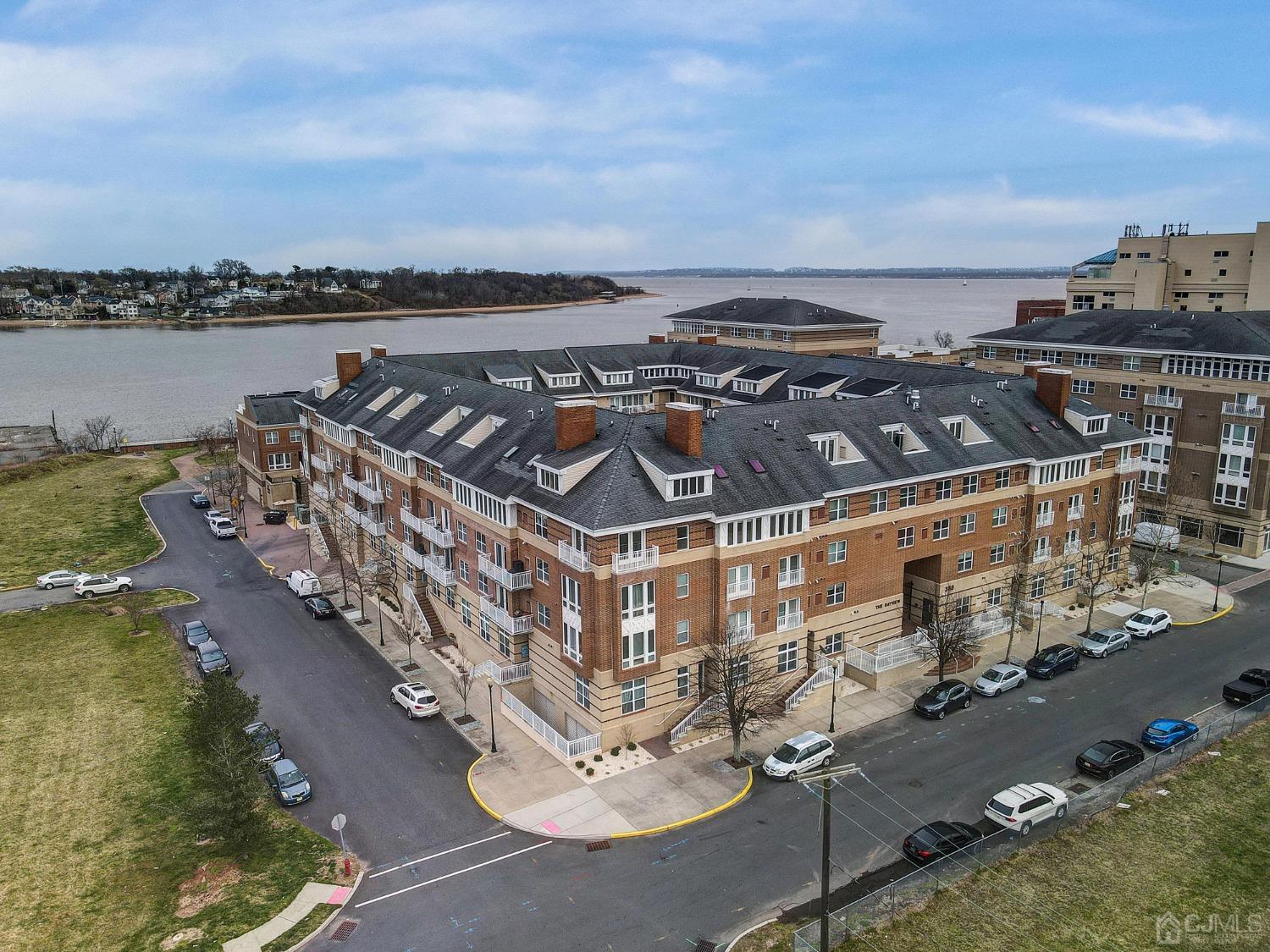 368 Rector Street, Unit 417 Perth Amboy, NJ 08861 - Photo 1 of 27 a view of a city with ocean
