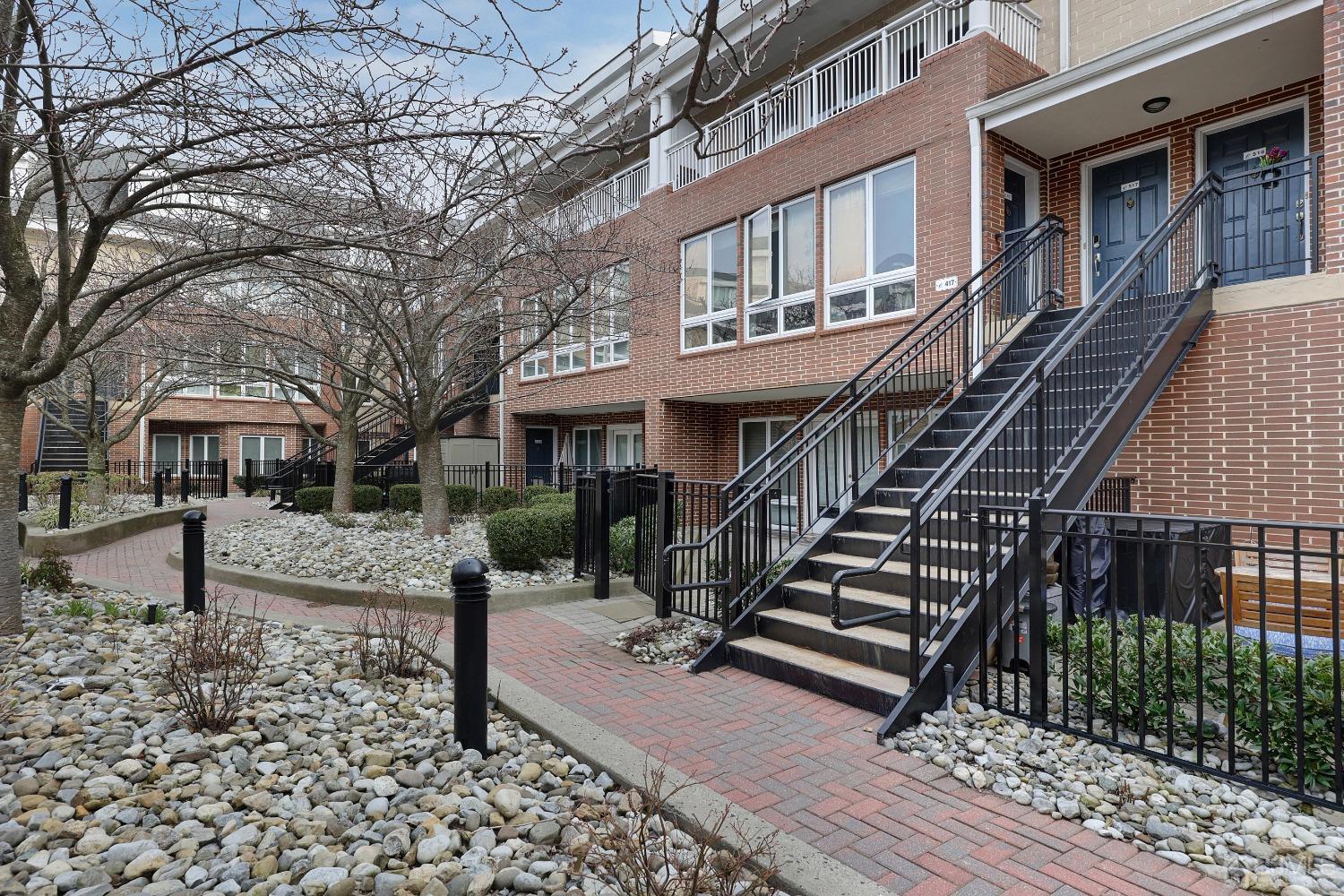 368 Rector Street, Unit 417 Perth Amboy, NJ 08861 - Photo 19 of 27 a front view of a house with a yard